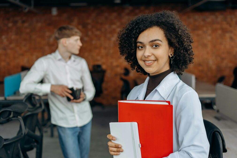 Young professionals working together in a modern office environment.